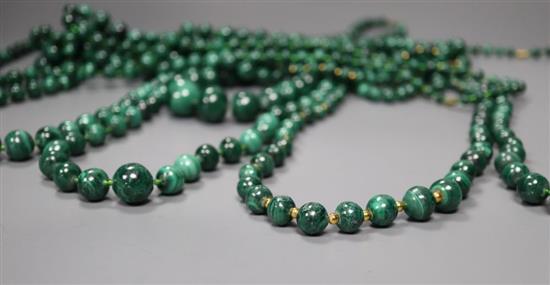 Ten assorted graduated malachite bead necklaces, two with gilt metal spacers, largest approximately 66cm,